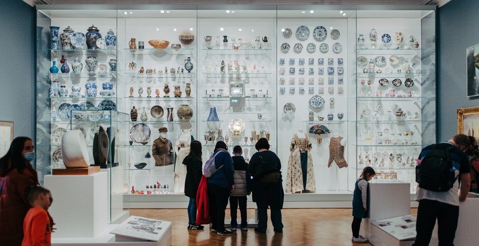 People browsing an art gallery at The Box